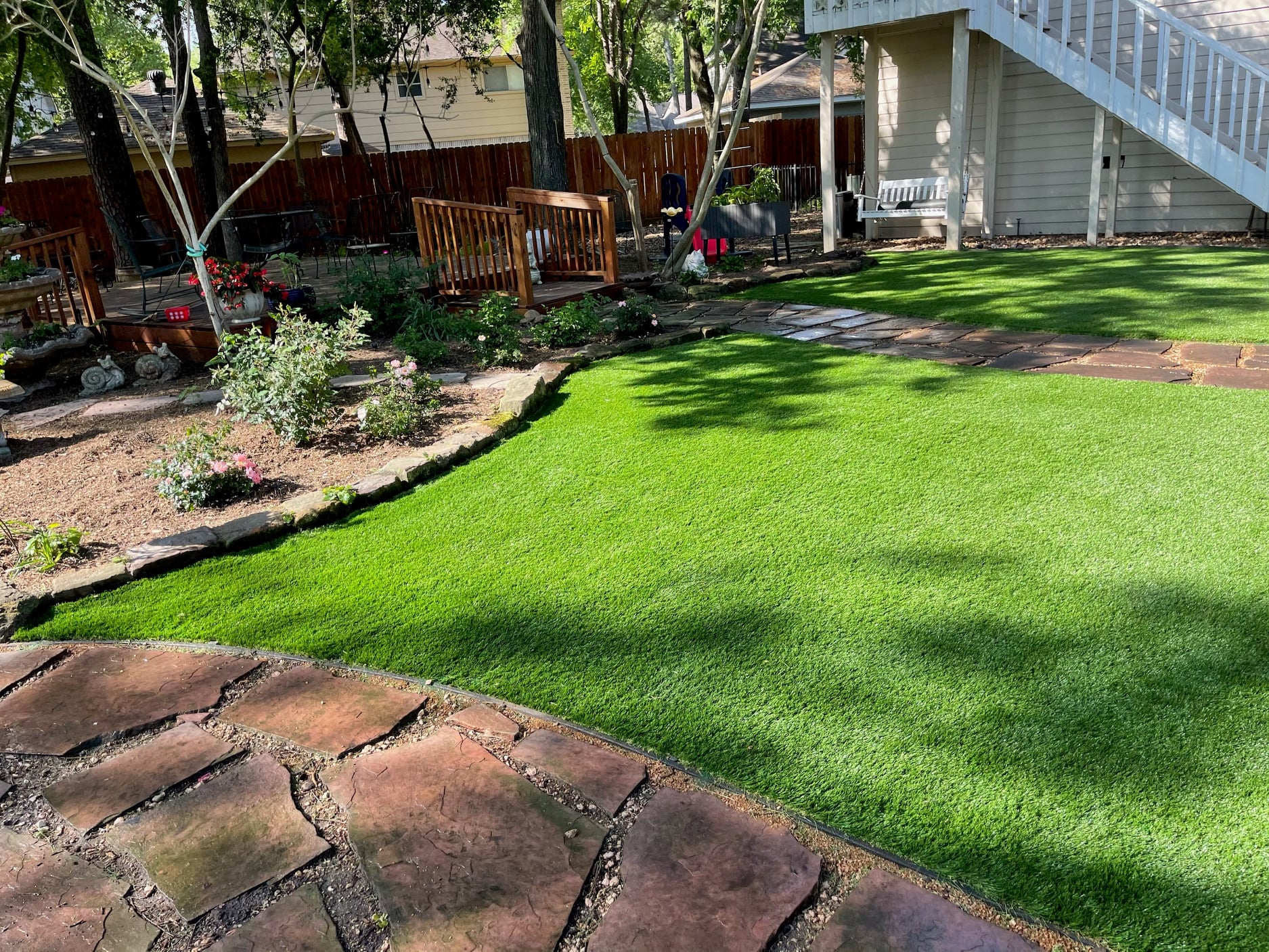 A Backyard Featuring Lush Artificial Grass
