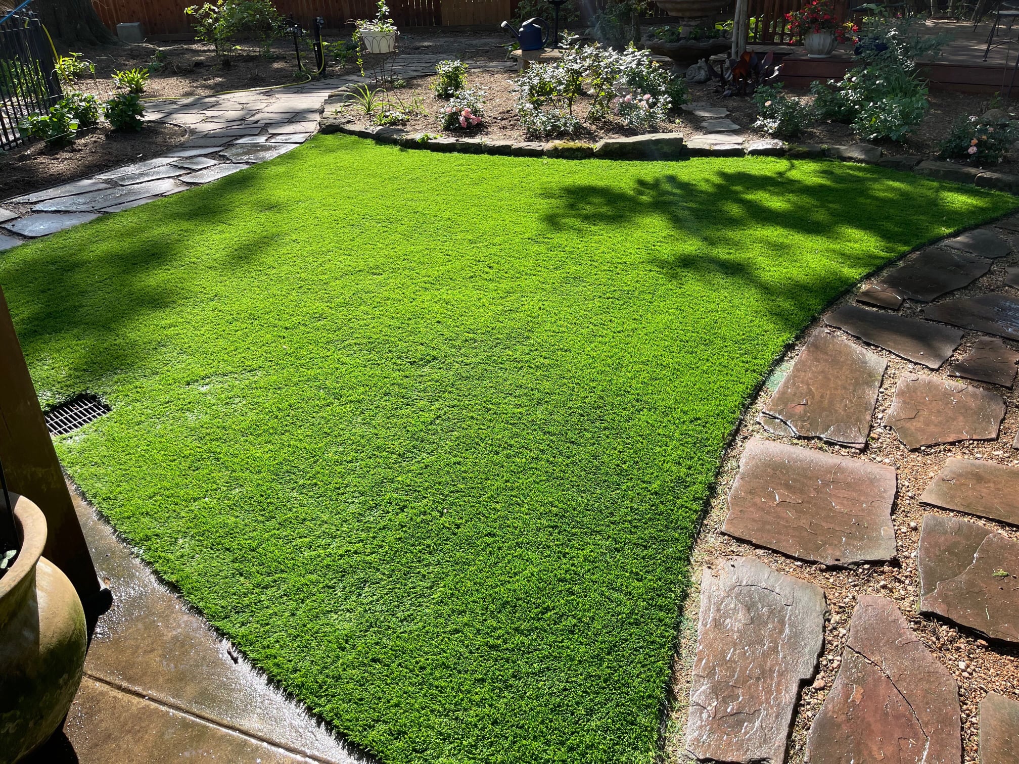 Backyard Featuring A Pristine Layer Of Artificial Grass